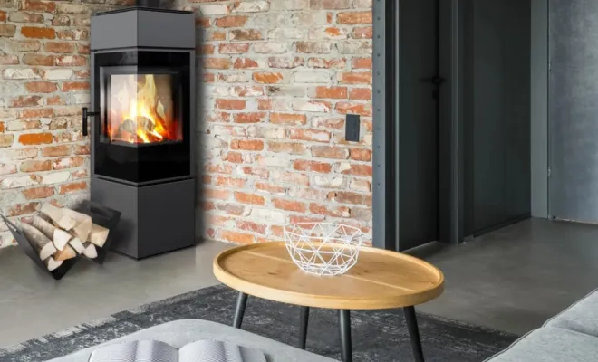 Le poêle à bois Luisa est élégant et performant.  Son design sobre en noir ajoute une touche intemporelle à votre décoration. Grâce à sa capacité de bûches de 35 cm, il chauffe efficacement une pièce jusqu’à 60 m2. Le poêle Luisa est équipé d’une porte en fonte avec vitre céramique offrant une vue captivante sur les flammes, et d’une chambre de combustion en panneaux Termotec pour une performance optimale.  Optez pour le poêle à bois Luisa et profitez d’un chauffage autonome, esthétique et efficace.